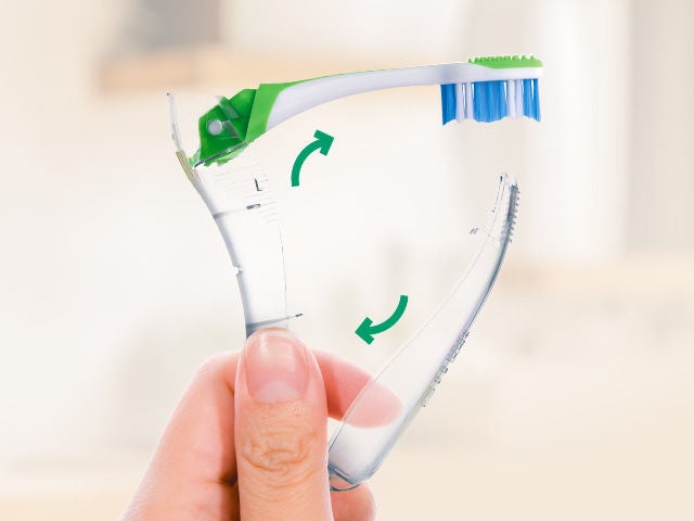  In-context-GUM-TRAVEL-Toothbrush-held-in-hand