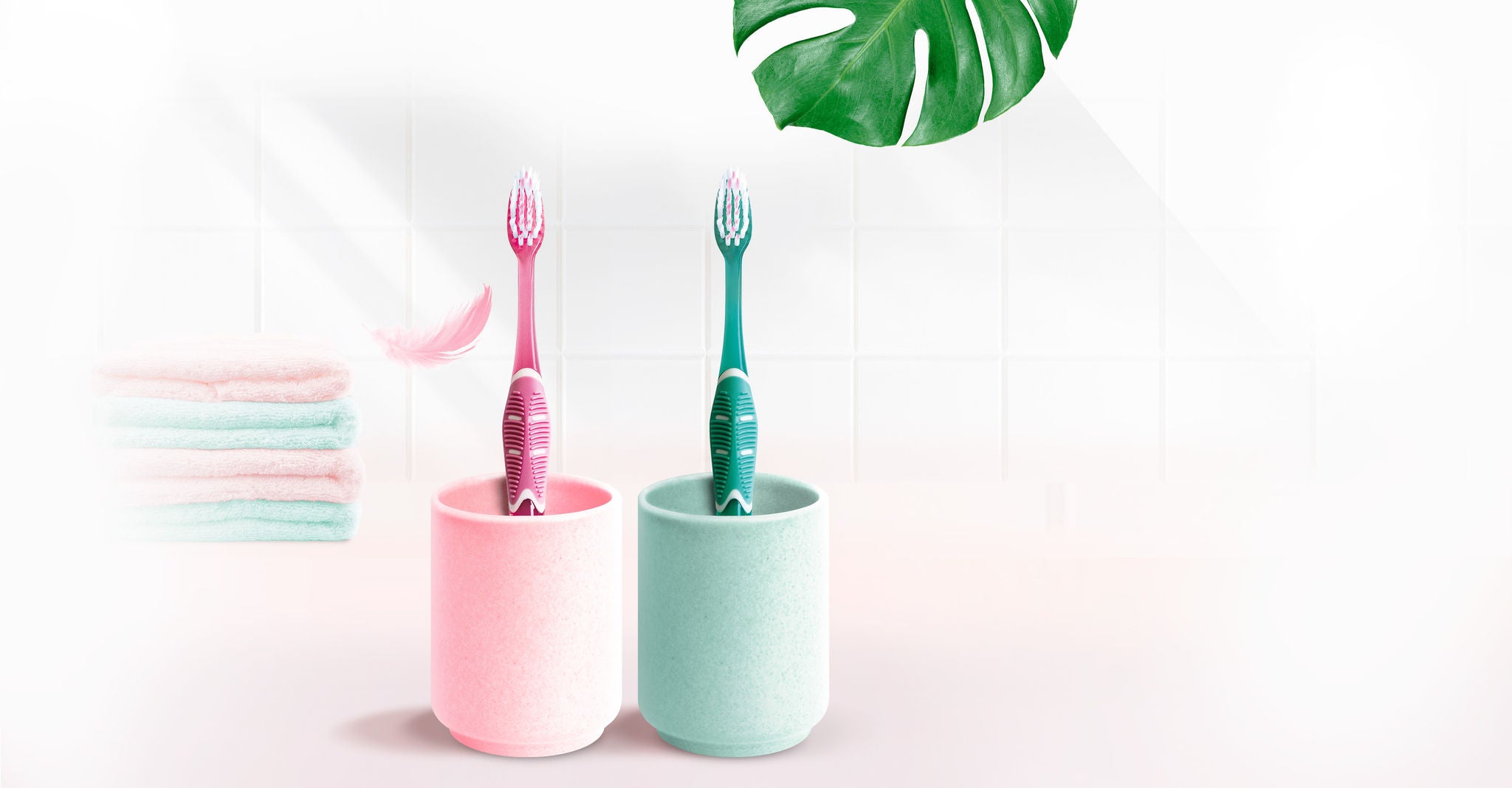 Two GUM PRO SENSITIVE Toothbrushes in their glass