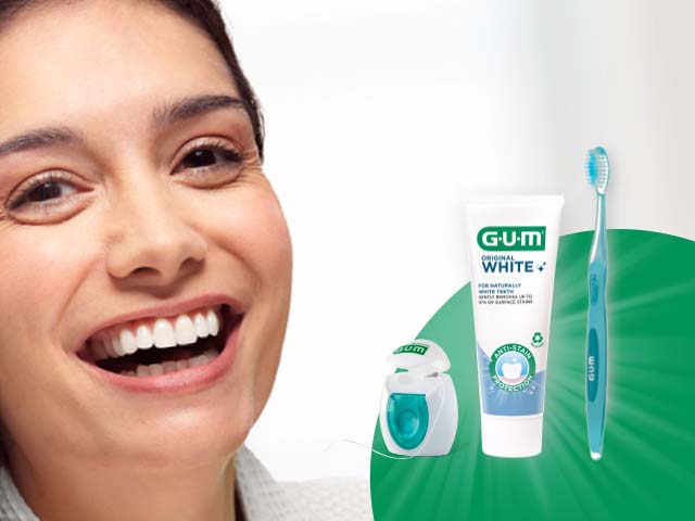 Smiling woman and GUM products: GUM ORIGINAL WHITE floss, GUM ORIGINAL toothbrush and toohpaste
