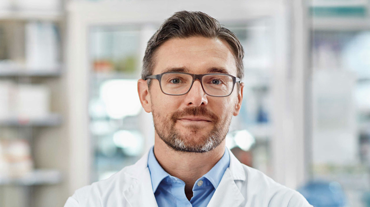 OCP-Dentist wearing glasses close up